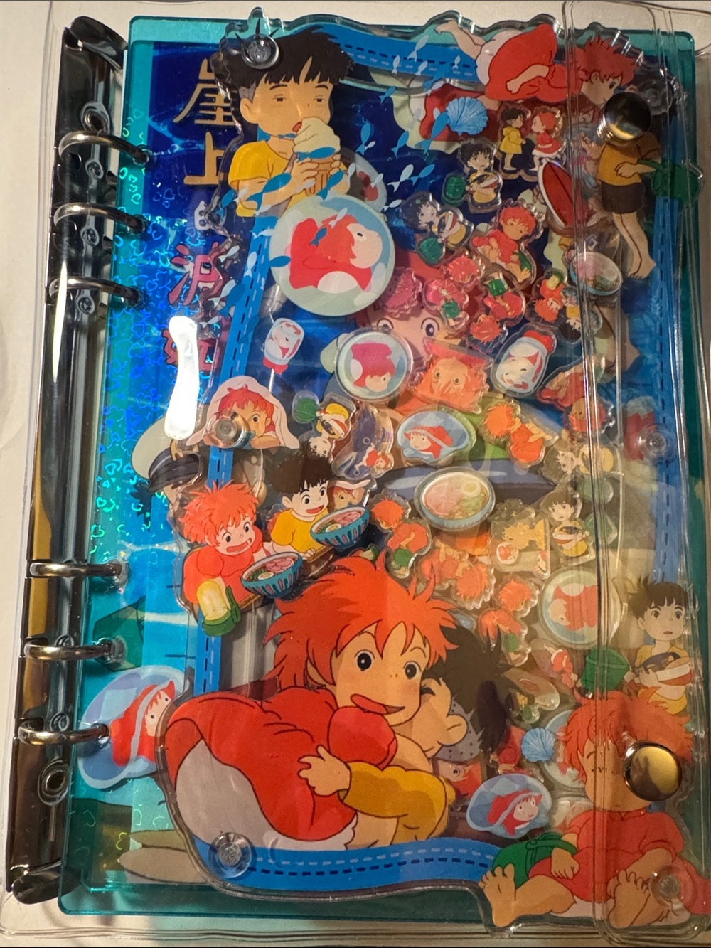 Ponyo shaker binder with PVC cover